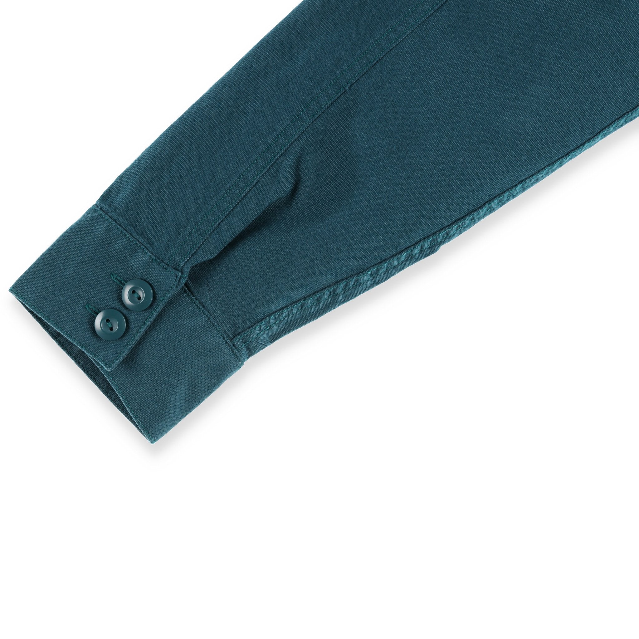 General shot of Topo Designs Men's Dirt shirt Jacket in Pond Blue showing sleeve and BDU buttons on cuff.