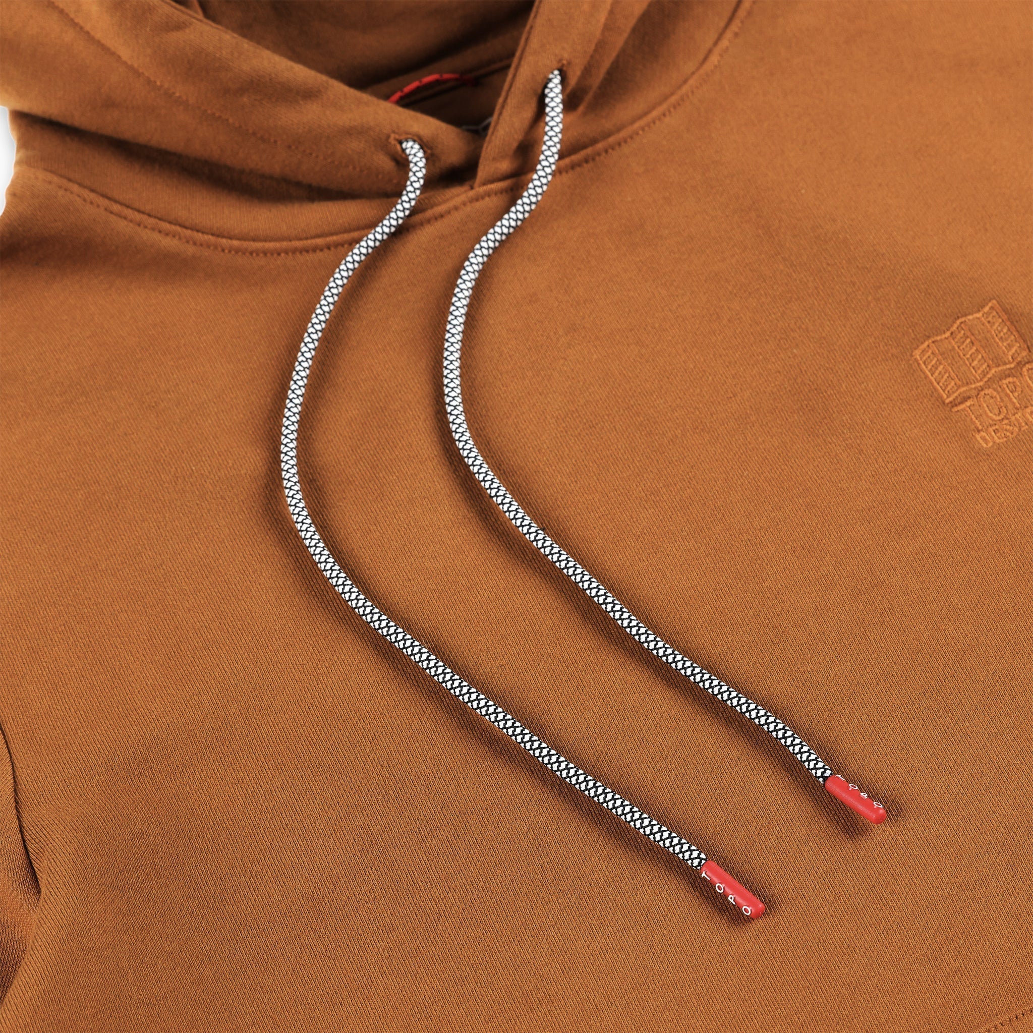 Detail shot of custom drawstrings & embroidered chest logo on Topo Designs Men's Dirt Hoodie 100% organic cotton French terry sweatshirt in "Earth" brown. Show on "Pond Blue".