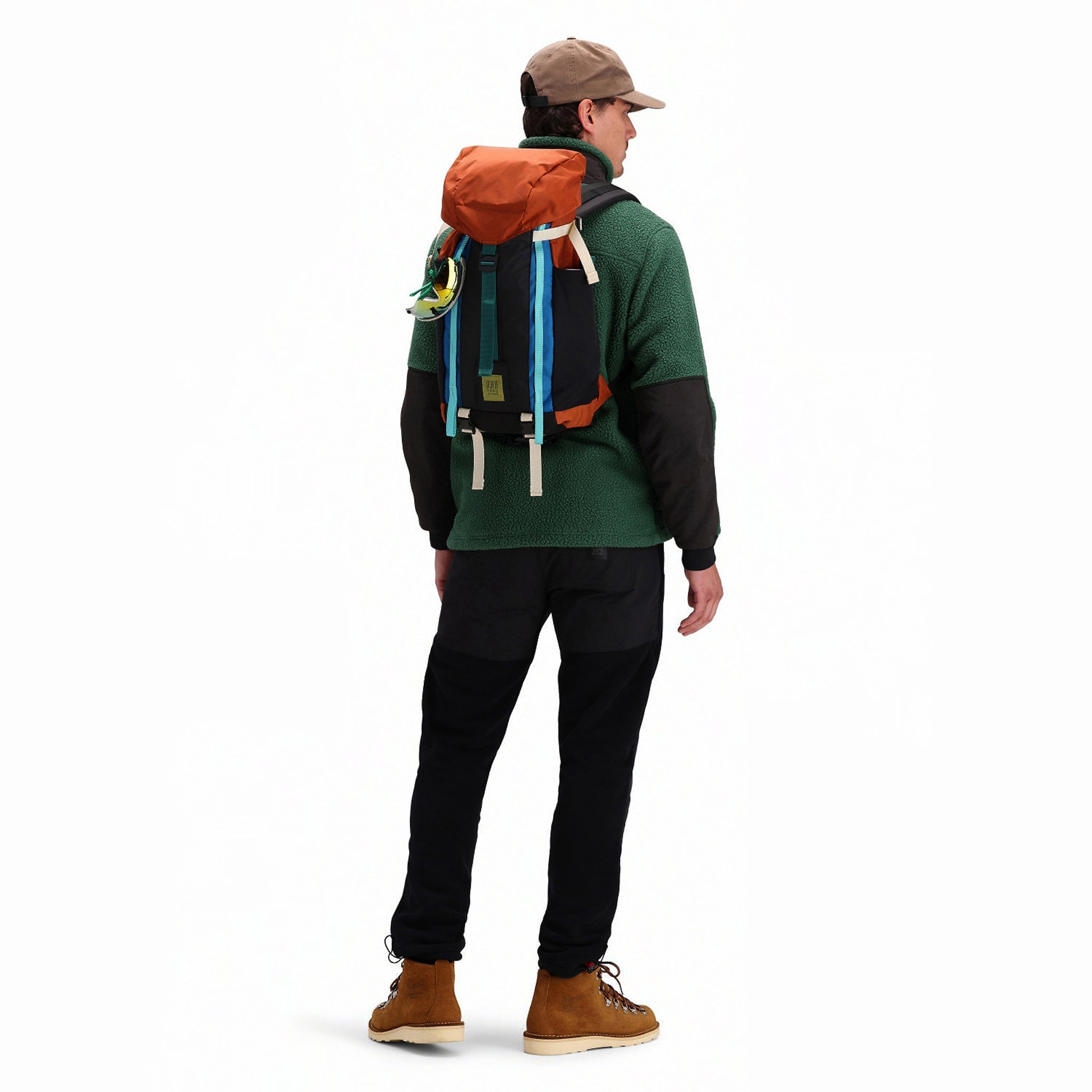 Back model shot of Topo Designs Men's Mountain Fleece Pullover in "Forest" green.