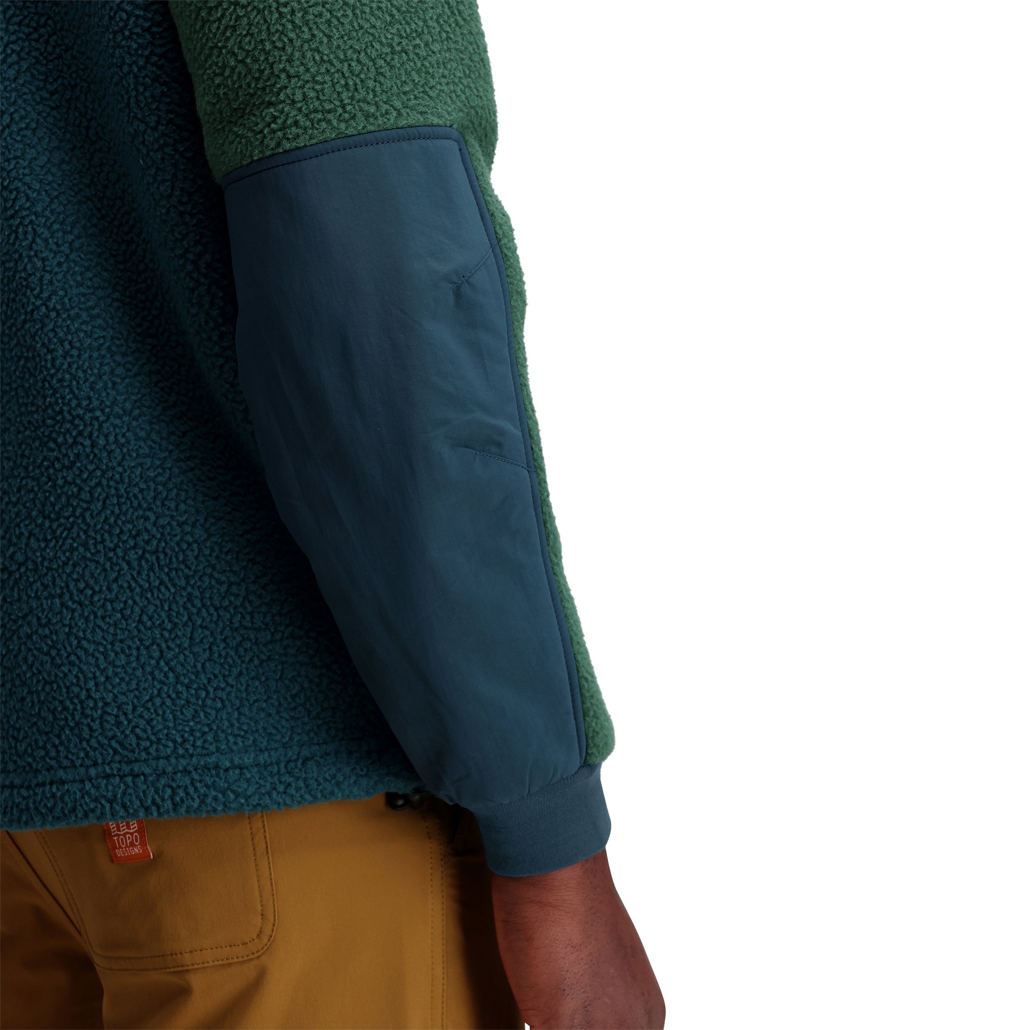 General shot of M Mountain Fleece Pullover in "Forest / Pond Blue"