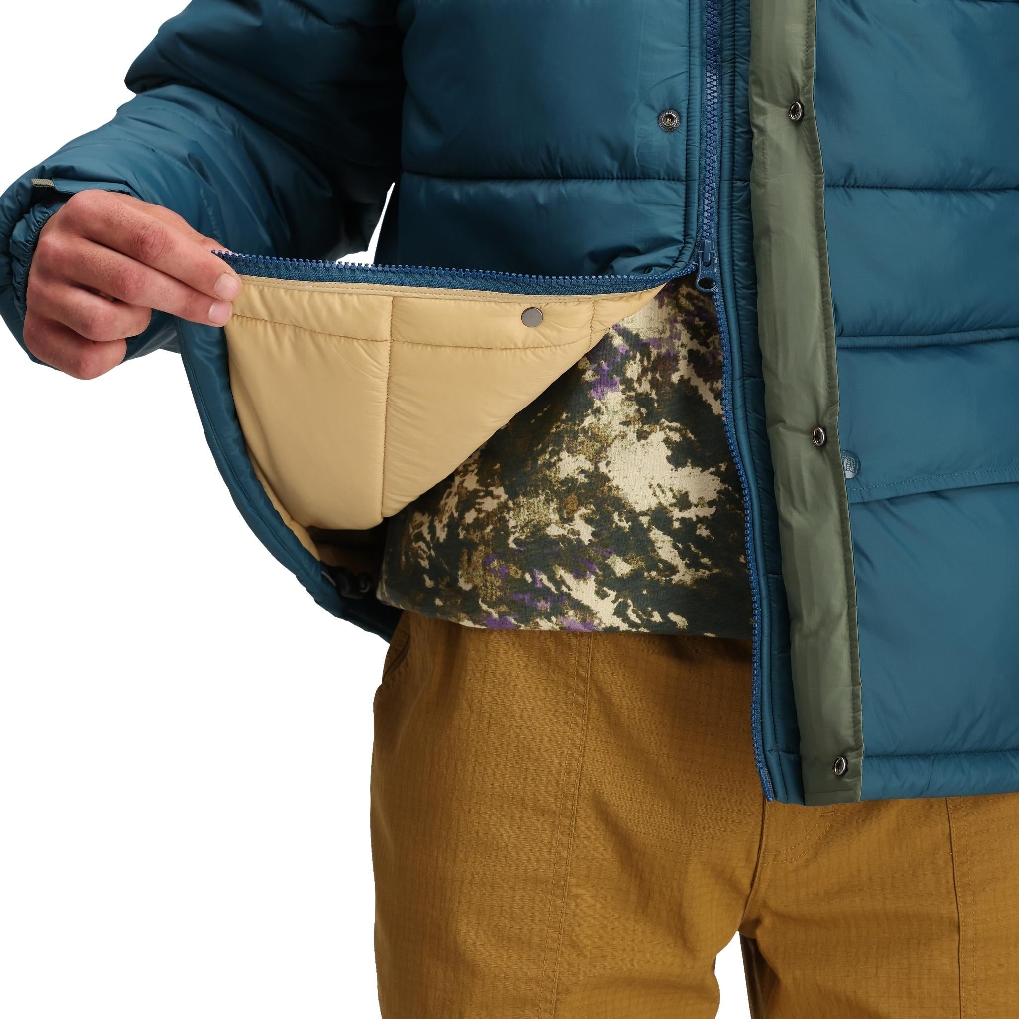 Detail shot of Topo Designs Retro Ridge Puffer Jacket - Men's  in "Pond Blue / Beetle"