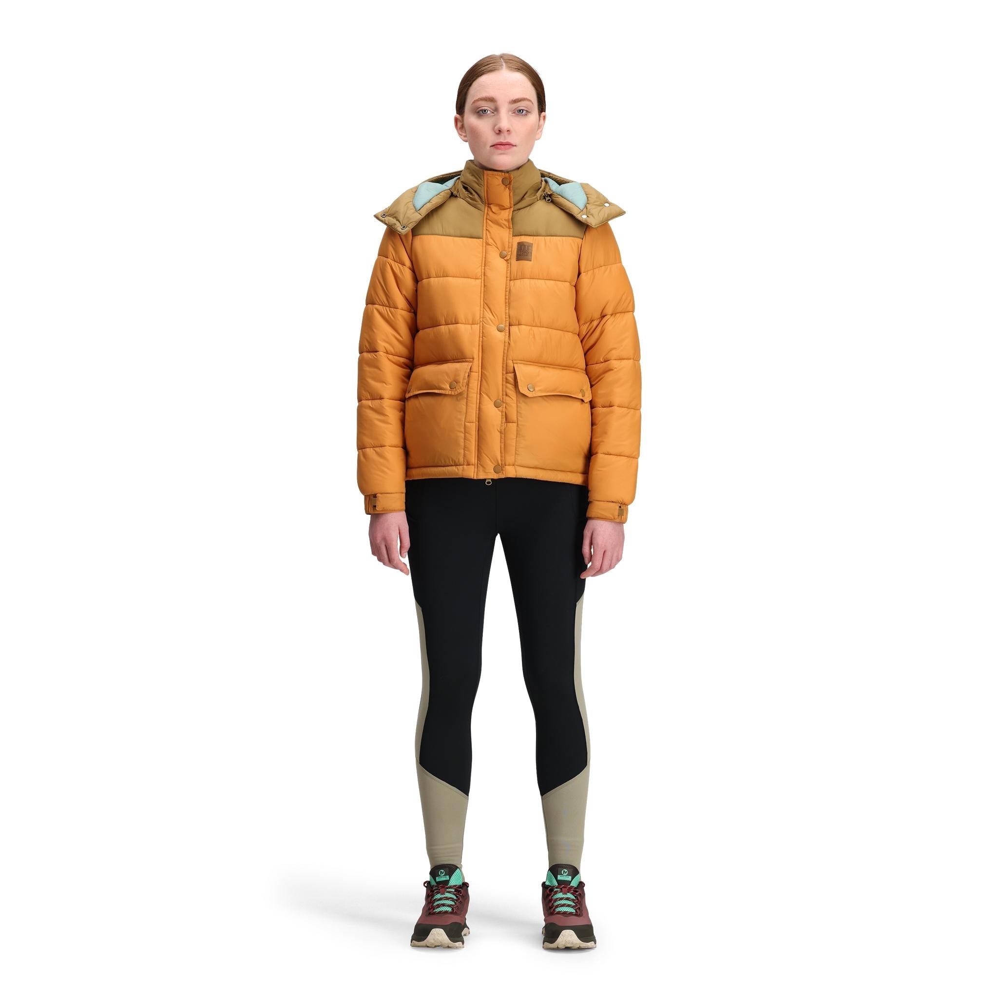 General front model shot of Topo Designs Retro Ridge Puffer Jacket - Women's  in "Dark Khaki / Spice"