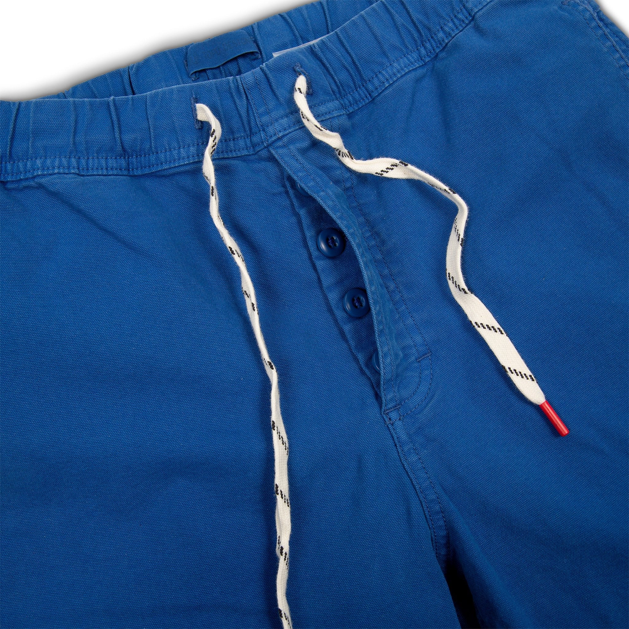 General shot of Topo Designs Men's drawstring Dirt Shorts in True Blue showing button fly.