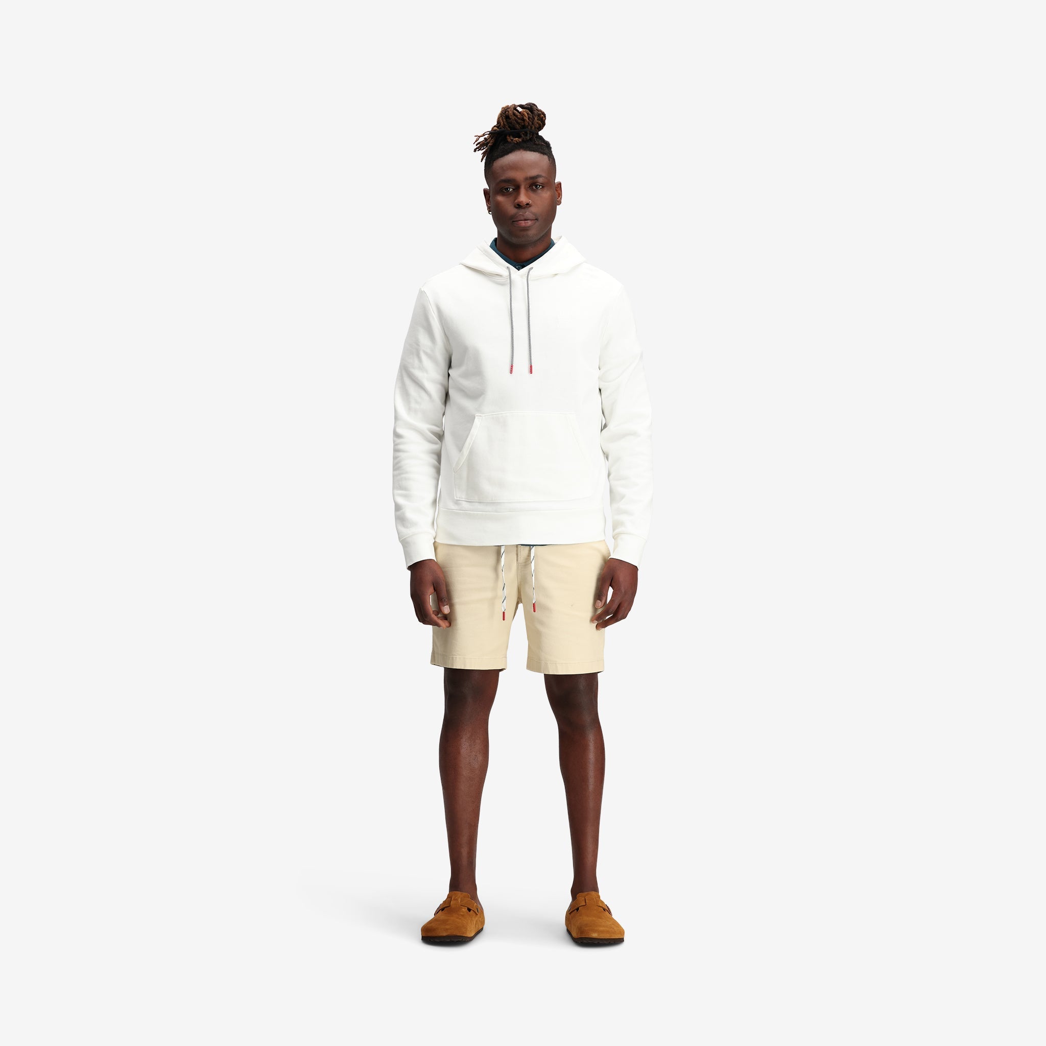 On model shot of Topo Designs Men's Dirt Hoodie 100% organic cotton French terry sweatshirt in "natural" white.