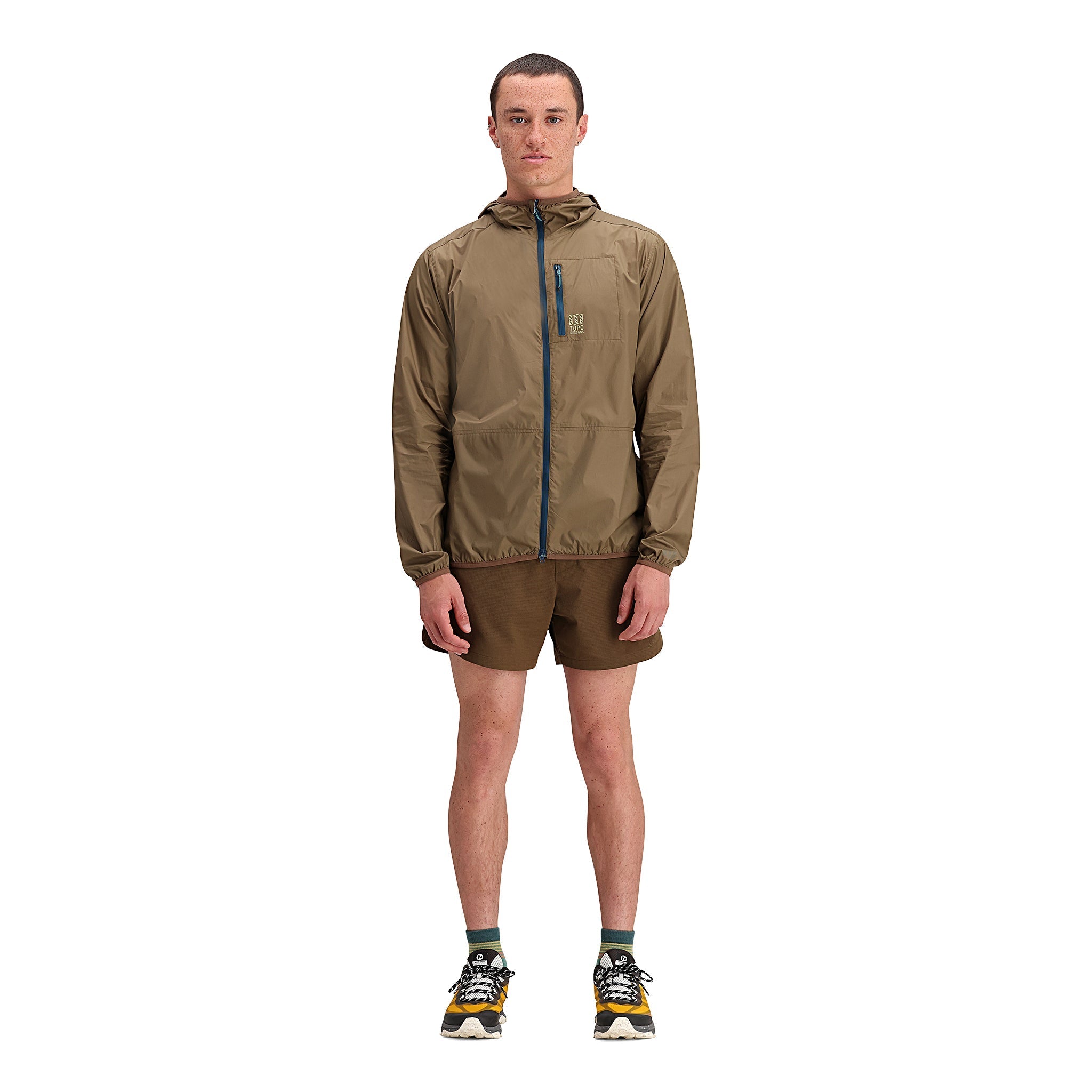 General front model shot of Topo Designs Global Ultralight Packable Jacket - Men's in "Desert Palm"