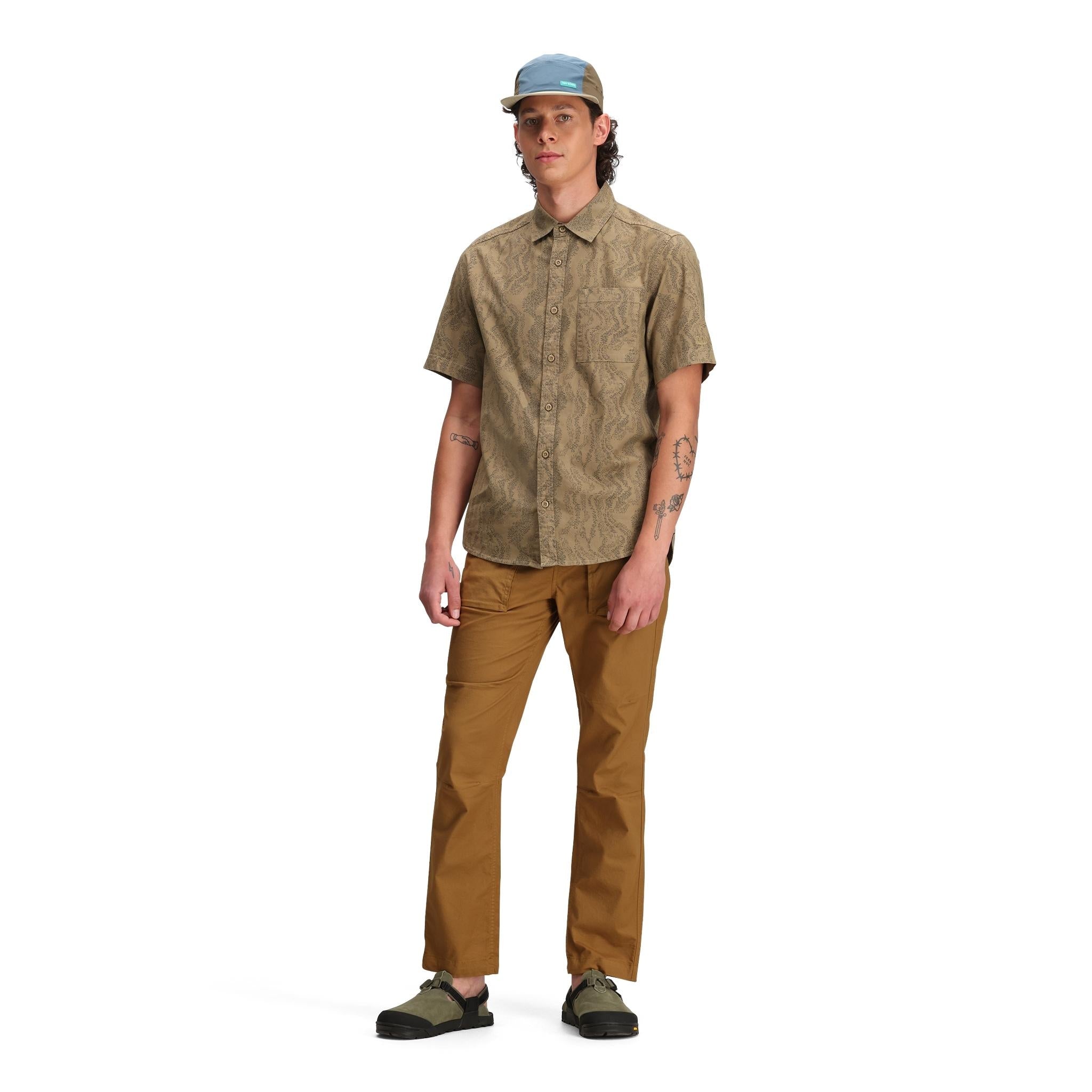 General front model shot of Topo Designs Dirt Desert Pants - Men's in "Dark Khaki"