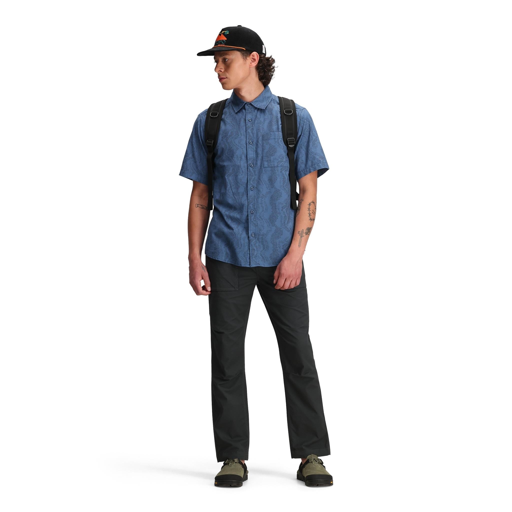 General front model shot of Topo Designs Dirt Desert Shirt Ss - Men's  in "Stone Blue River Bed"