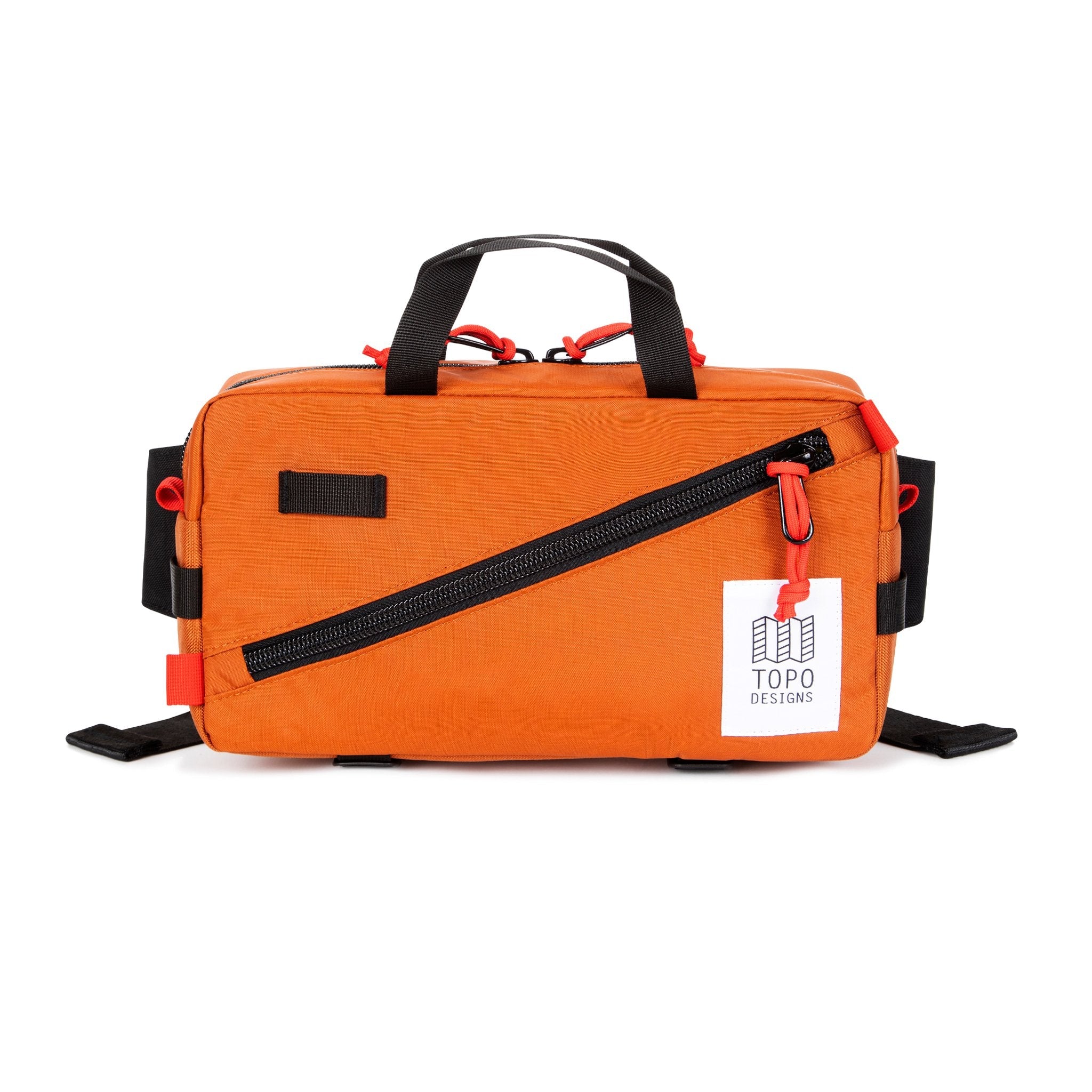 Topo Designs Quick Pack hip fanny pack in Clay orange.