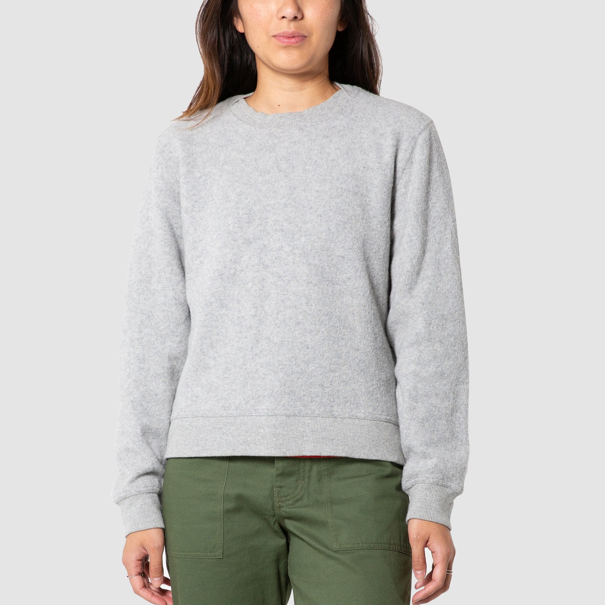 Front model shot of women's global sweater in gray