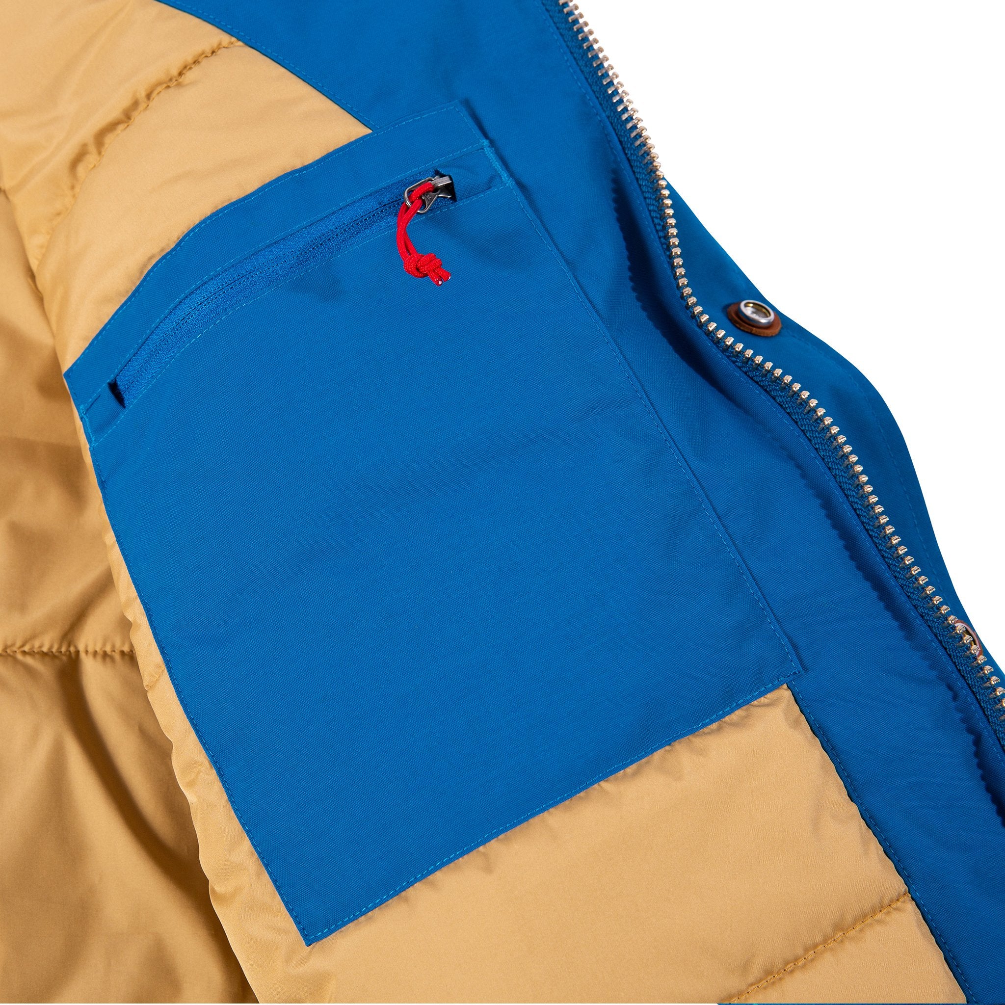 Product shot of men's mountain jacket in blue showing interior pocket