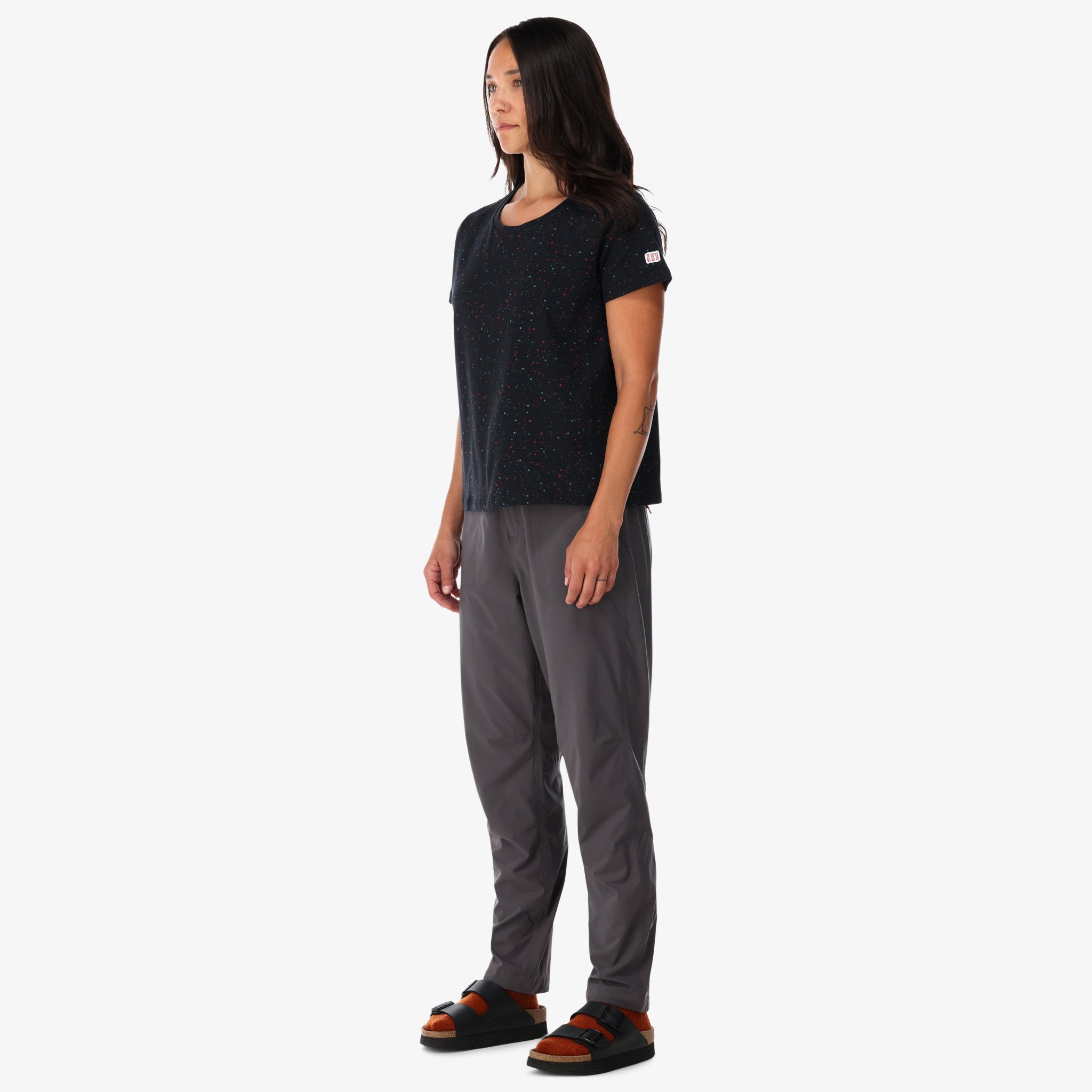 General side shot of Topo Designs Women's organic cotton Cosmos t-shirt in black on model.