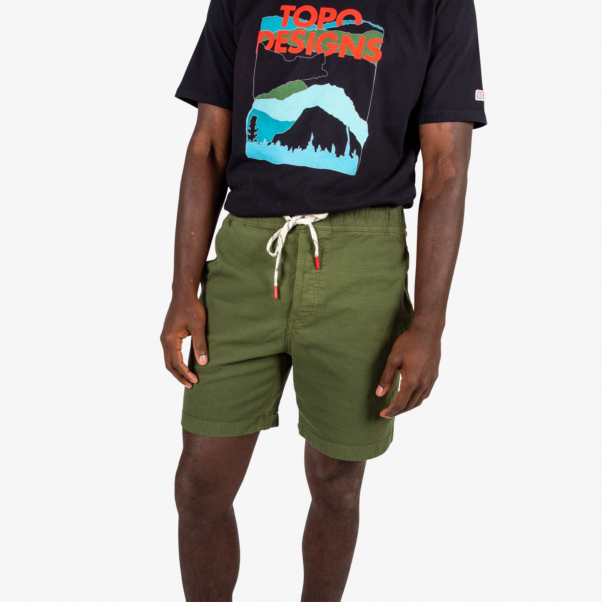 Topo Designs Men's drawstring Dirt Shorts in "Olive" green on model.