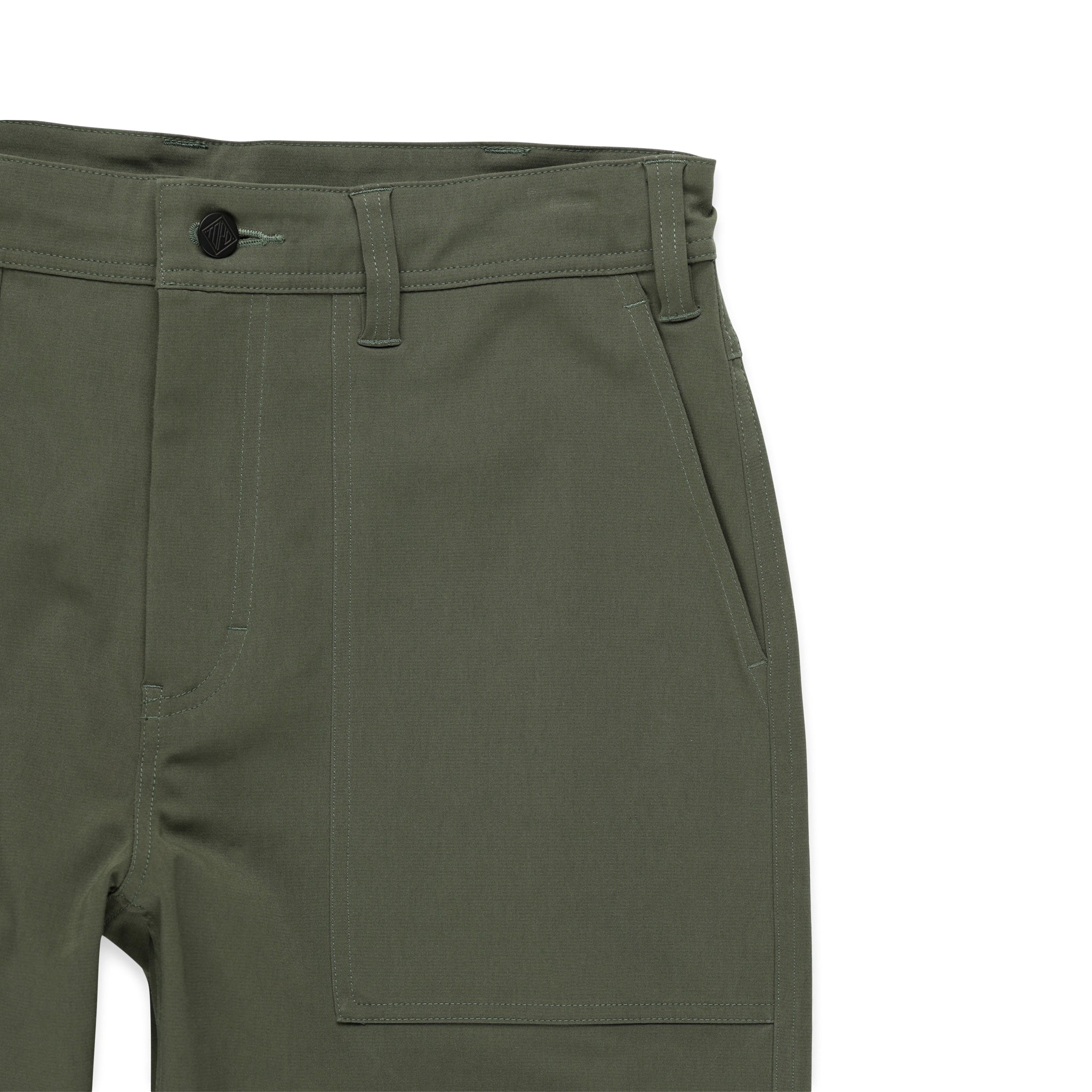 Front pockets on Topo Designs Men's Global Pants lightweight cotton nylon travel pants in olive green.